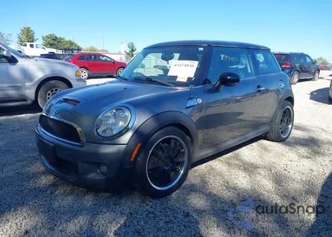2009 Mini Cooper S z USA, uszkodzony, nr VIN WMWMF73539TX40375